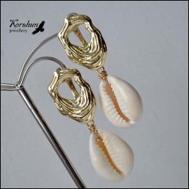 Пляжный Бохо с раковинами Каури: как ракушка завоевала планету